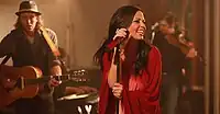 A view of Sara Evans performing in concert.