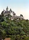 Image 26Coloured black and white photograph: the Burgberg with Wernigerode Castle (between 1890 and 1905) (from List of mountains and hills of the Harz)