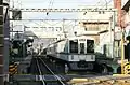 A Seibu 4000 series EMU at platform 2 with a through service to Ikebukuro, December 2010