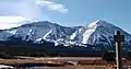 Sentry Mountain on the right, but some maps label the peak on the left as Sentry Mountain as it is slightly higher.The peak to left is unofficially known as "Ostracized Peak".