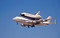 Shuttle Atlantis arriving at Davis–Monthan Air Force Base, Tucson, Arizona during the return trip from Edwards Air Force Base to Kennedy Space Center in April 1996.