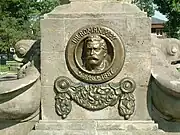 Detail of medallion of chemist, teacher, social activist and industrialist Roman May on The Sower's Monument in Luboń (1923).