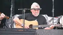 Simon Nicol performing at Fairport's Cropredy Convention 2014