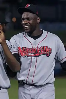 A baseball player in gray