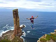 Alexander Schulz walks slackline at the Old Man of Hoy