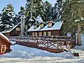 Snowy wooden house