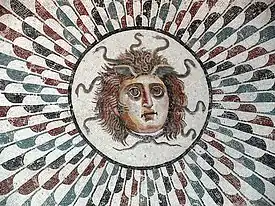 The Medusa's head central to a mosaic floor in a tepidarium of the Roman era. Museum of Sousse, Tunisia