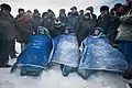 Kaleri, Skripochka and Kelly sit in chairs after they landed.