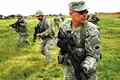 Members of the California State Military Reserve perform squad drills.