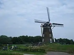 Riders taking a break at the St Hubert windmill.