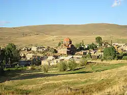 The village of Garnahovit with the  imposing Church of S. Gevorg (center).