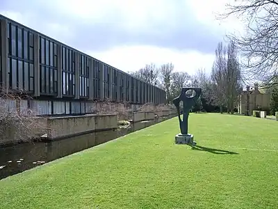 St Catherine's College with a Barbara Hepworth sculpture near the eastern end of Manor Road.