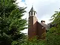 St Olave's Church, Woodberry Down, Manor House, London, 1893 by Ewan Christian, stair-turret with stone conical roof