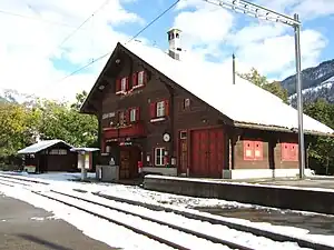 Three-story chalet-style building