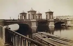 Bridge in 1880. The central wooden span of the strut system is visible.