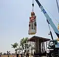 Idol being moved into position