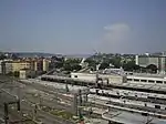 The station from a neighbouring building, with the Piramide station in the background