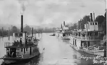 Echo (left), Liberty (right), and Dispatch (center-right) at Coquille circa 1910.