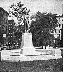 A black and white photograph of a statue in Detroit