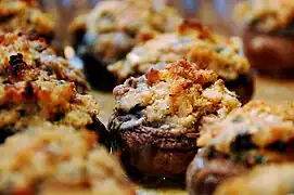 Close-up view of cooked stuffed mushrooms