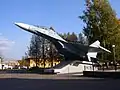 Model of Sukhoi Su-27 in front of Ufa engine-building production association