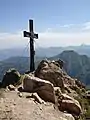 Summit cross on Großer Rettenstein. Behind: Kleiner Rettenstein.