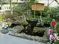 A manji-shaped pond at a Buddhist temple