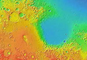 MOLA colorized topographic map showing Isidis Planitia (right) and the adjacent low-relief shield volcano Syrtis Major Planum (left).