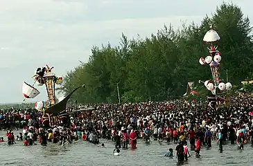 Tabuiks being lowered into the sea in Pariaman, Indonesia