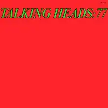 A red cover with "TALKING HEADS: 77" written at the top in green