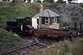 Diesel works train passing Marley Signal box on the running line. A headshunt from Marley Yard crossed the line here for a few yards before it was lifted in 2012.