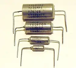 Axial style tantalum electrolytic capacitors