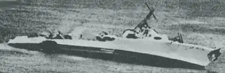 The destroyer Bedouin, crippled by gunfire from the 7th Cruiser Division; sinking after being hit by an aerial torpedo some hours later.