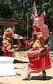 Muthappan Theyyam as Lord Vishnu and Lord Shiva.