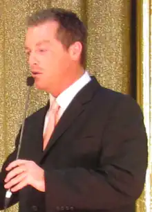 Photo of Todd Newton hosting the live-on-stage edition of the Price is Right at the Jubilee theater in Las Vegas, 2010.