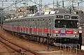 8-car set 9001 with a headmark commemorating its final run on the Toyoko Line, February 2013