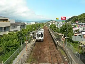 View of the station platforms in 2010. The roof of the station waiting room can just be seen at the extreme right.