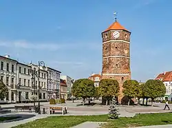 Market square with the medieval tower of the town hall