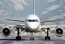 Forward view of aircraft, showing fuselage profile, two circular engines.