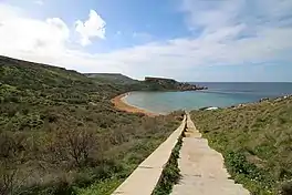 Several hundred steps leading to a sandy beach