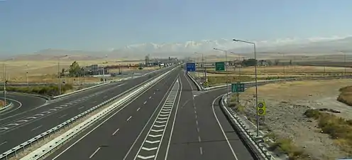 Turkish state road D 750 at Konya junction. Toros Mountains in the background.