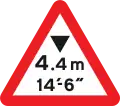 Warning of maximum headroom of arch bridge/overhanging structure some distance ahead (sign also used at the bridge itself)