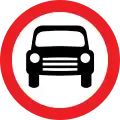 Motor vehicles except solo motorcycles prohibited. This sign may additionally display an exception plate (for example: 'Except for access')