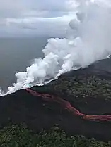 Lava enters the sea at two locations after crossing Hawaii Route 137