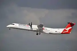 A De Havilland Canada Dash 8-400 in the former livery