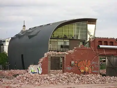 The warehouses under demolition on 1 June 2006. The Kiasma Museum of Contemporary Art in the background.