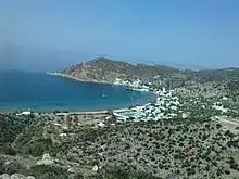 Photograph from the hillside showing Vathy next to a bay