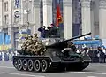 Historical troops on the T-34 tank.