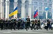 Personnel of the Independent Presidential Regiment marching with a unit from the Russian Airborne Troops on Maidan Nezalezhnosti during the parade.