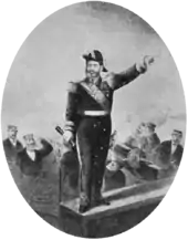 Engraving depicting a man in an admiral's uniform, spyglass in hand and left hand pointing forward, standing on a platform aboard a ship while sailors fire cannons in the background